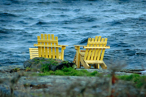 Yellow Chairs Oceanside stock photo