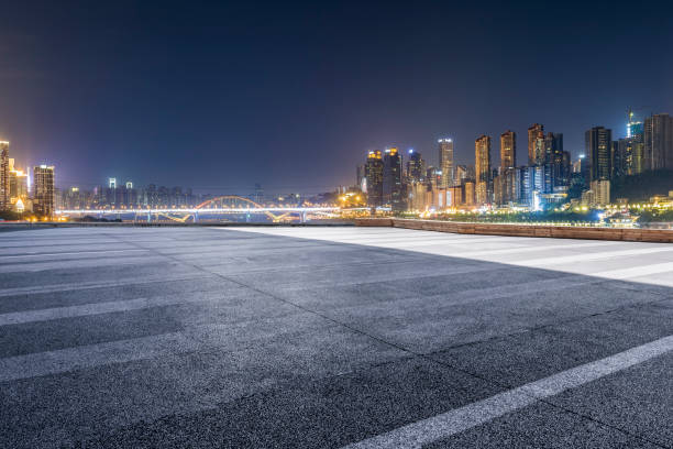istock Panoramic skyline and modern business office buildings with empty road,empty concrete square floor 969964176