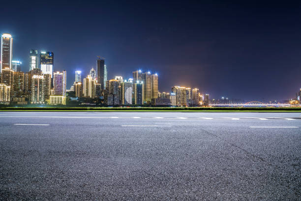 istock Panoramic skyline and modern business office buildings with empty road,empty concrete square floor 969964390