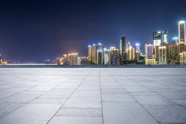 istock Panoramic skyline and modern business office buildings with empty road,empty concrete square floor 969964480