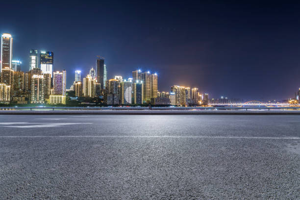 istock Panoramic skyline and modern business office buildings with empty road,empty concrete square floor 969964486