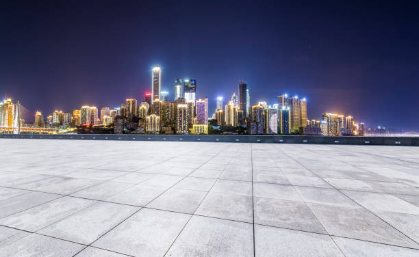 istock Panoramic skyline and modern business office buildings with empty road,empty concrete square floor 969964528