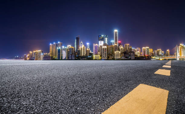 istock Panoramic skyline and modern business office buildings with empty road,empty concrete square floor 969965276
