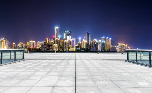 istock Panoramic skyline and modern business office buildings with empty road,empty concrete square floor 969966826
