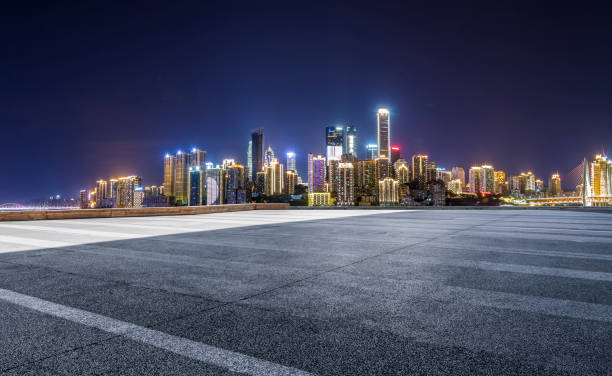 istock Panoramic skyline and modern business office buildings with empty road,empty concrete square floor 969966836