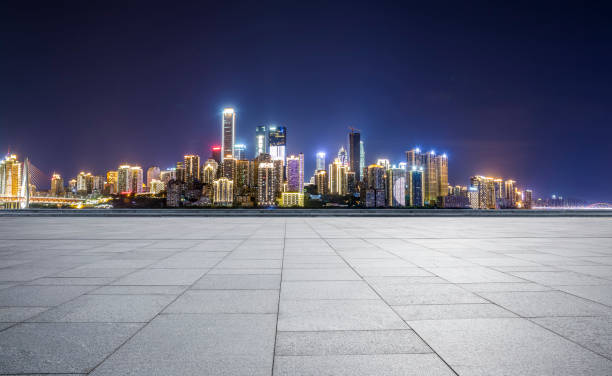 istock Panoramic skyline and modern business office buildings with empty road,empty concrete square floor 969966870