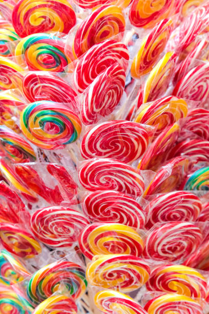 old fashioned swirl lollipops - candy hard candy wrapped variation imagens e fotografias de stock