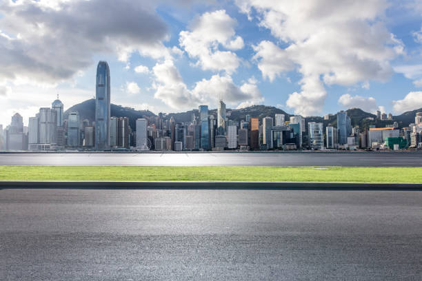 istock Panoramic skyline and modern business office buildings with empty road,empty concrete square floor 969967074