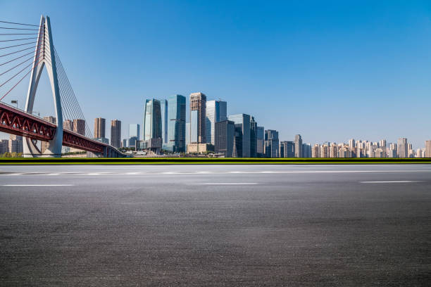 istock Panoramic skyline and modern business office buildings with empty road,empty concrete square floor 969967492