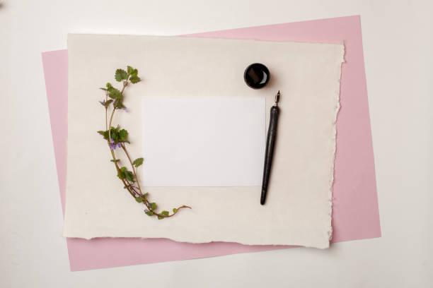 istock Flat lay composition, workspace with quote follow your heart written in calligraphy style on white paper. Artist working place, wedding greeting concept 969967530