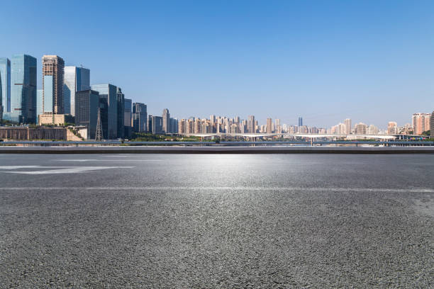 istock Panoramic skyline and modern business office buildings with empty road,empty concrete square floor 969967578