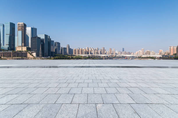 istock Panoramic skyline and modern business office buildings with empty road,empty concrete square floor 969968966