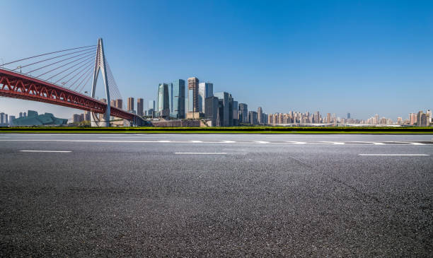istock Panoramic skyline and modern business office buildings with empty road,empty concrete square floor 969970204