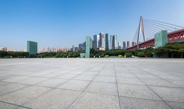 istock Panoramic skyline and modern business office buildings with empty road,empty concrete square floor 969970214