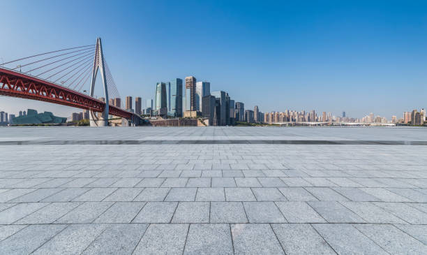 istock Panoramic skyline and modern business office buildings with empty road,empty concrete square floor 969970434