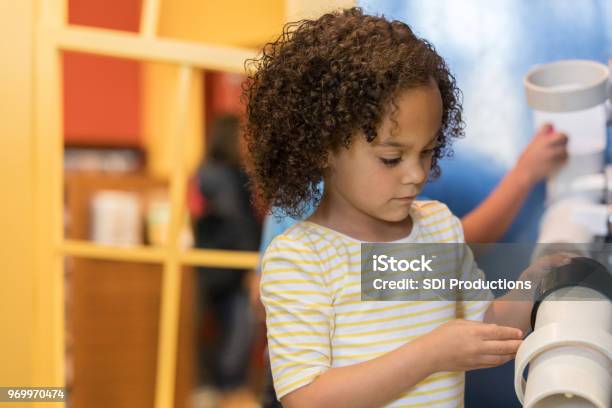 Adorable Preschooler Playing In Discovery Center Stock Photo - Download Image Now - Museum, Child, Childhood