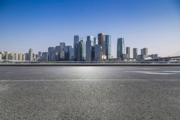 istock Panoramic skyline and modern business office buildings with empty road,empty concrete square floor 969970602