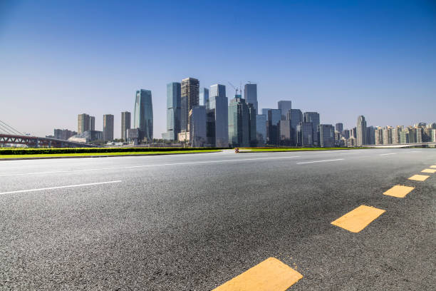 istock Panoramic skyline and modern business office buildings with empty road,empty concrete square floor 969970662