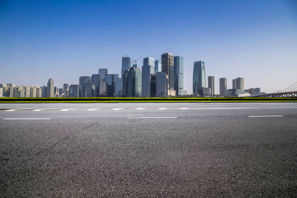 istock Panoramic skyline and modern business office buildings with empty road,empty concrete square floor 969970674