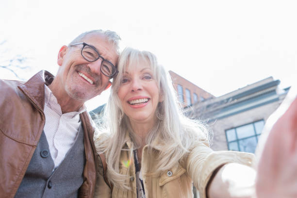 istock Senior couple take selfie while on vacation 969970764