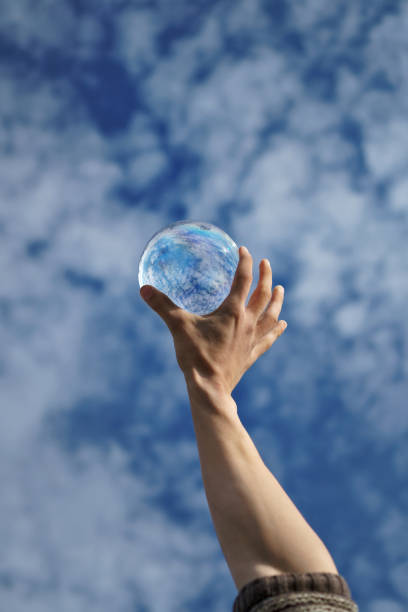 istock Contact juggling. Hand and acrylic ball 969970882