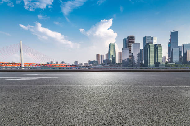 istock Panoramic skyline and modern business office buildings with empty road,empty concrete square floor 969976080