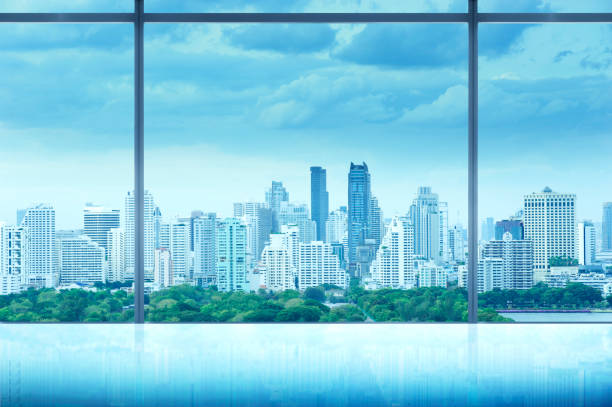 Amazing colorful sunset in big city. Roof top view with swimming pool. Landmark background