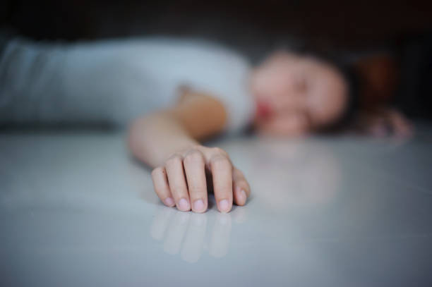 concept the women fall down on the floor close up at the hand
