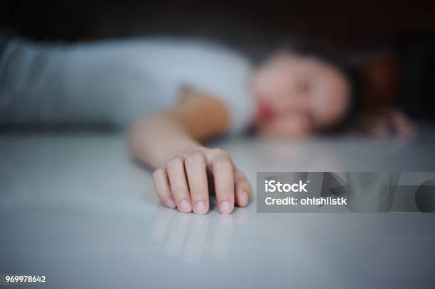 Concept The Women Fall Down On The Floor Close Up At The Hand Stock Photo - Download Image Now