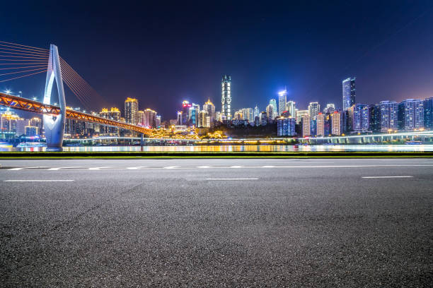 istock Panoramic skyline and modern business office buildings with empty road,empty concrete square floor 969981728