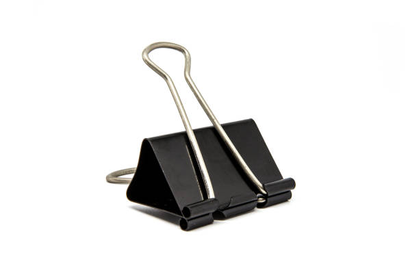 istock Black paper clip on white background 969991630