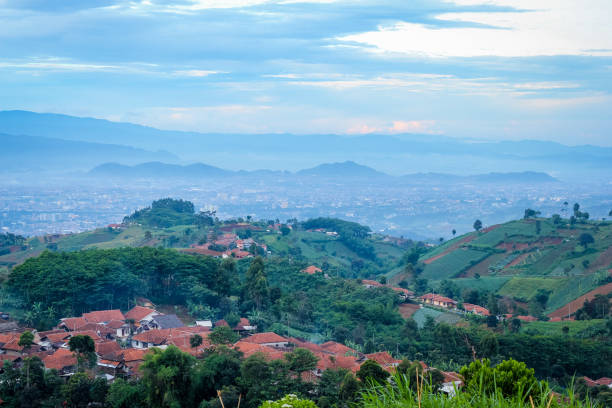 istock Misty Downtown Bandung in the Faraway Background 969994316