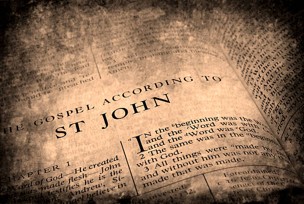 Bible St. John Open pages of bible isolated on white background gospel stock pictures, royalty-free photos & images