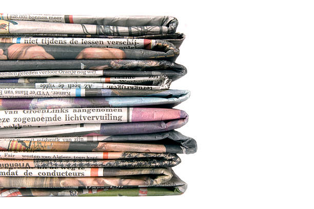 istock Pile of newspapers on a white background 97000529