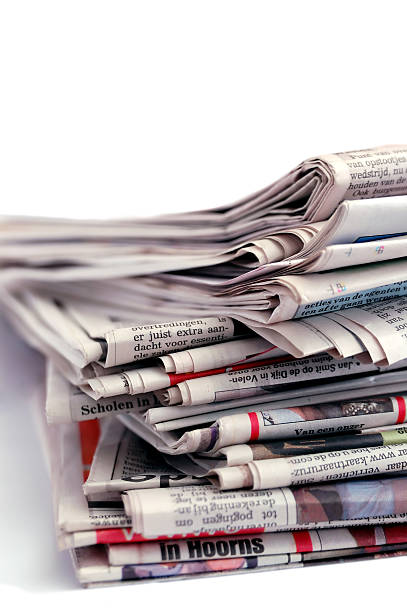 istock Pile of newspapers on a white background 97000592