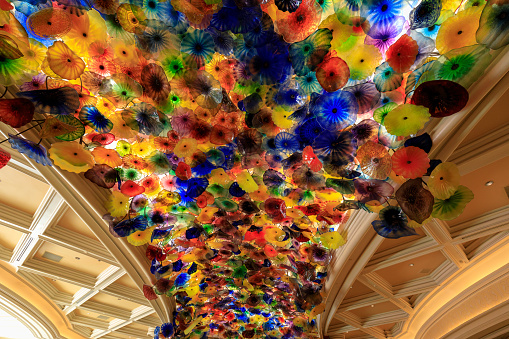 Las Vegas, Nevada - May 27, 2018 : Colorful Fiori di Como glass flower structure by sculptor Chihuly in the lobby of the Bellagio hotel and casino on the Las Vegas strip.