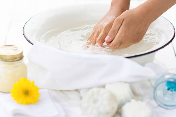 istock Child washes his hands in the white bowl 970007820