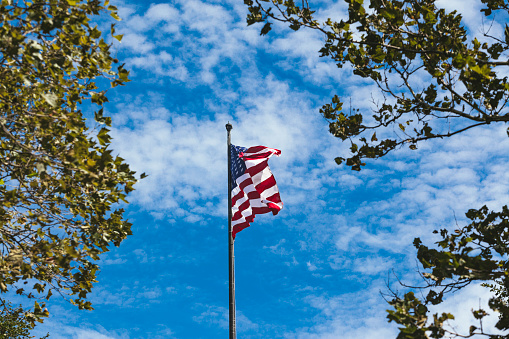American flag, liberty island, New York, USA