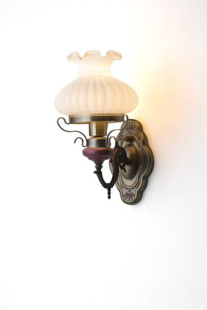 istock Classic wall light  shines on a white wall 970047420