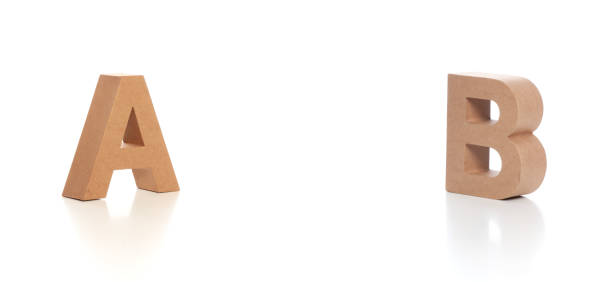 istock Cardboard capital letter A to B with copy space between them 970053288