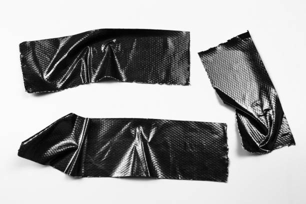 istock Set of black tapes on white background. Torn horizontal and different size black sticky tape, adhesive pieces. 970053520