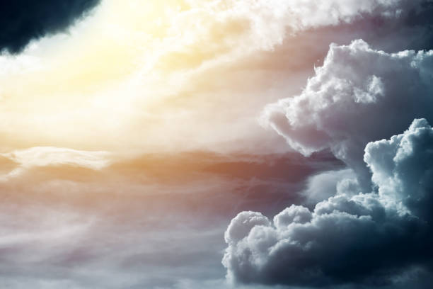 istock Beautiful warm divine light behind the stormy cloud 970060284