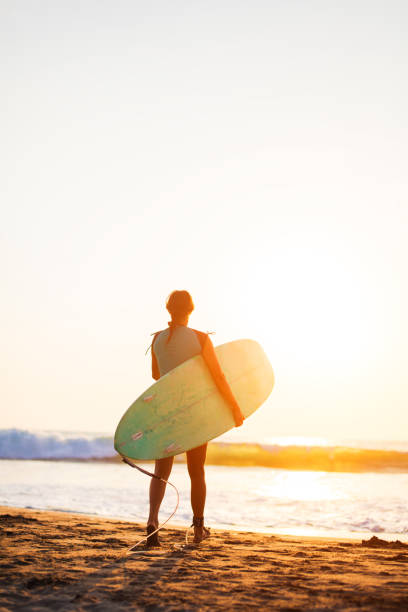 istock young surfer woman 970061008