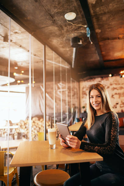 istock Woman sitting in cafe. 970061598