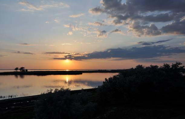 istock Sunset evening nature country summer water 970077512