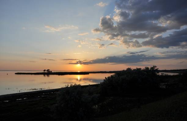 istock Sunset evening nature country summer water 970077528