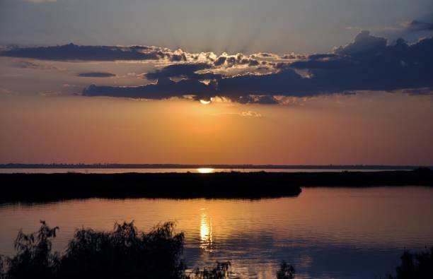 istock Sunset evening nature country summer water 970077684