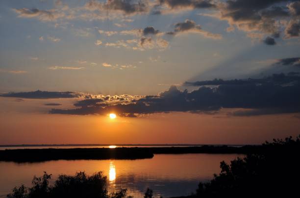 istock Sunset evening nature country summer water 970077698