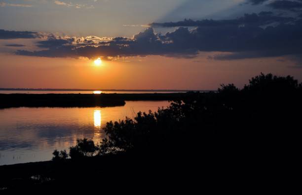 istock Sunset evening nature country summer water 970077802