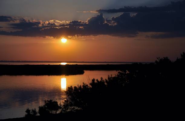 istock Sunset evening nature country summer water 970077848